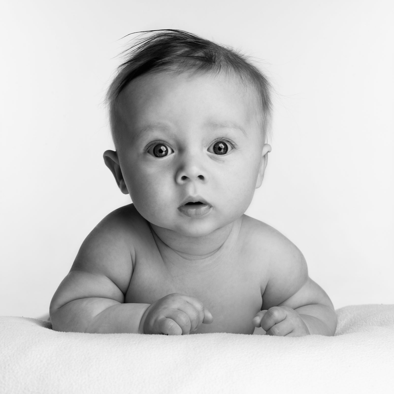 Baby about 4 months old in black & white
