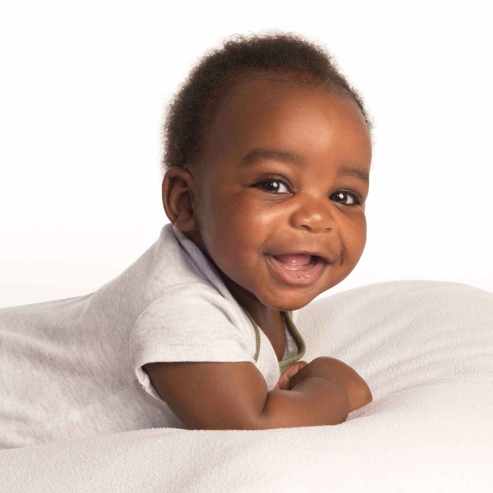 Portrait of a new baby in colour by PHOTOGENIC Dalkey