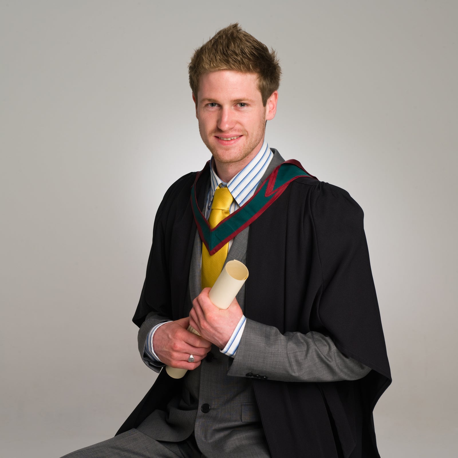 Graduation Portrait in of a young man by PHOTOGENIC Dalkey
