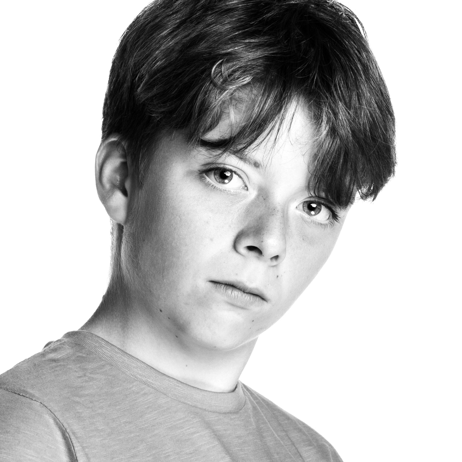 Teenage boy close up in a 60's style black and white image