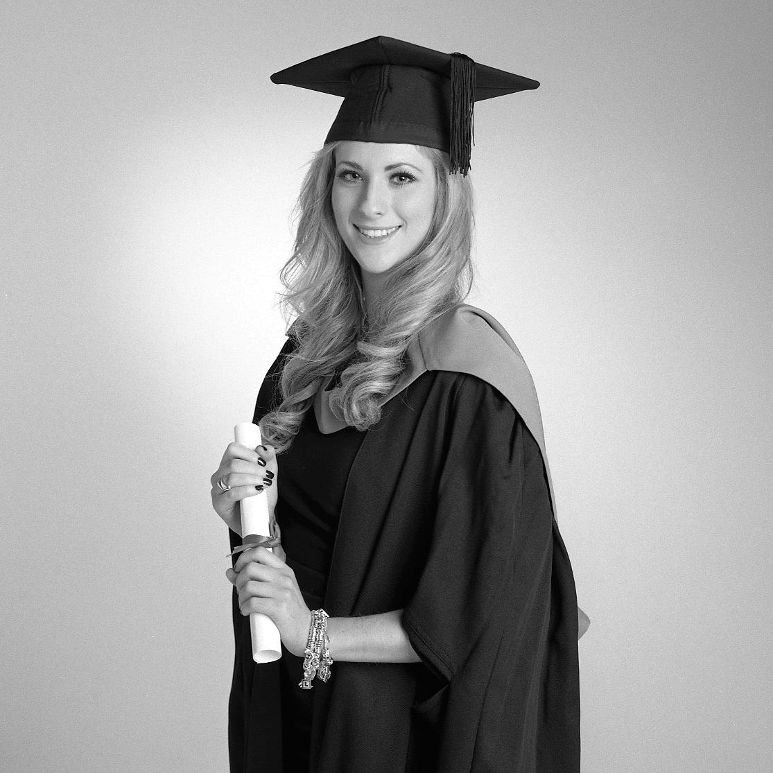 Graduation Portrait of a young woman in black and white by PHOTOGENIC Dalkey