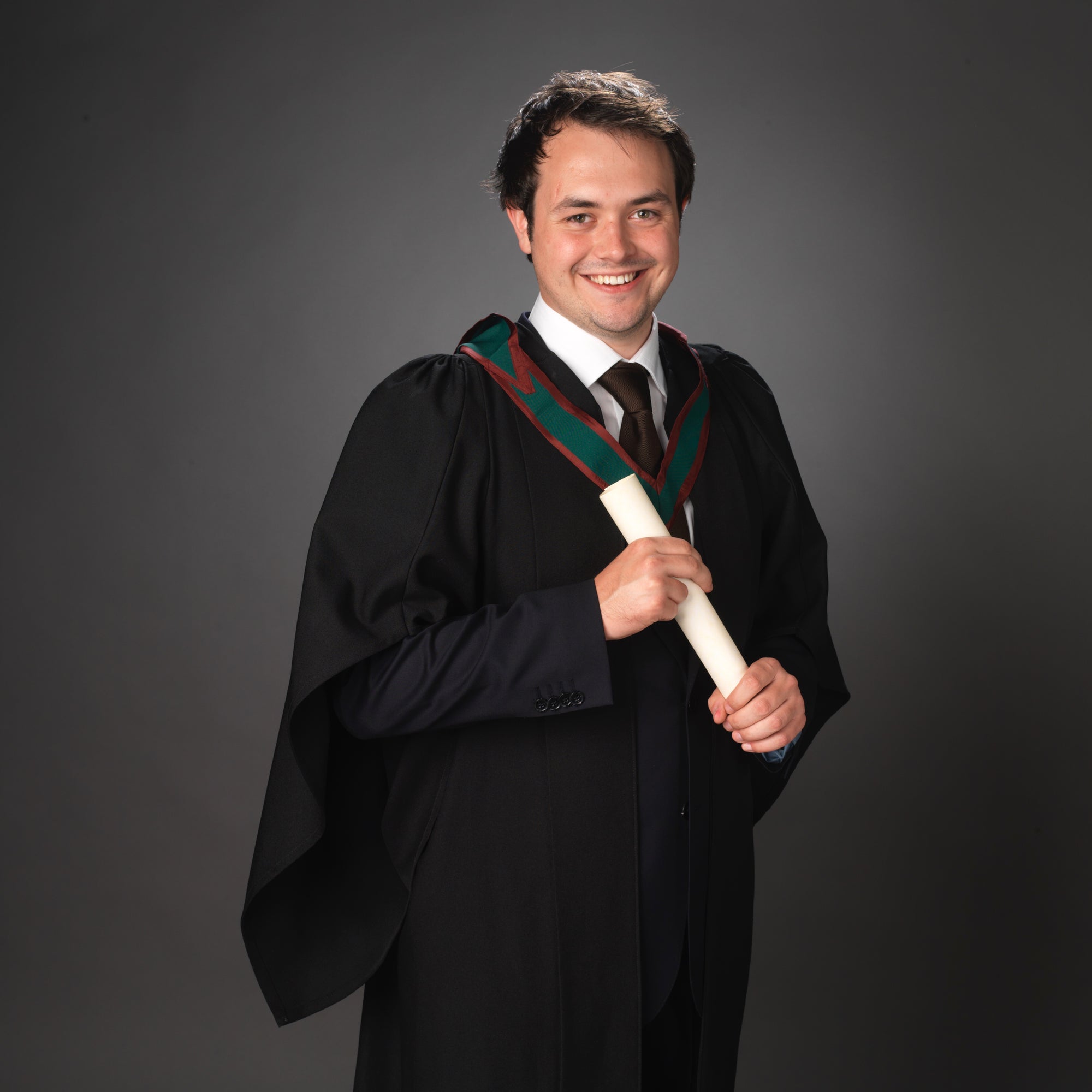 Graduation Portrait in of a young man by PHOTOGENIC Dalkey