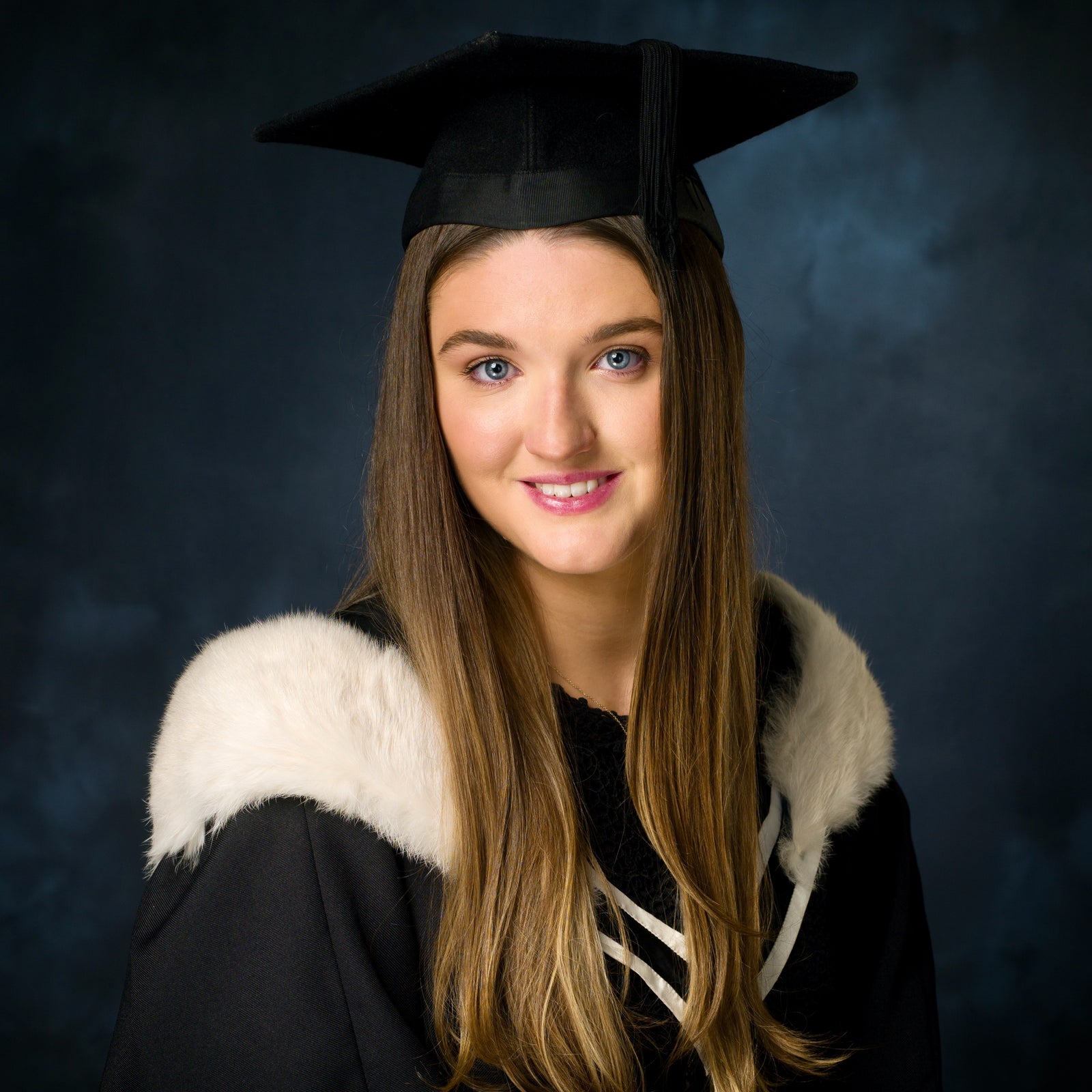 Graduation Portrait in of a young woman by PHOTOGENIC Dalkey