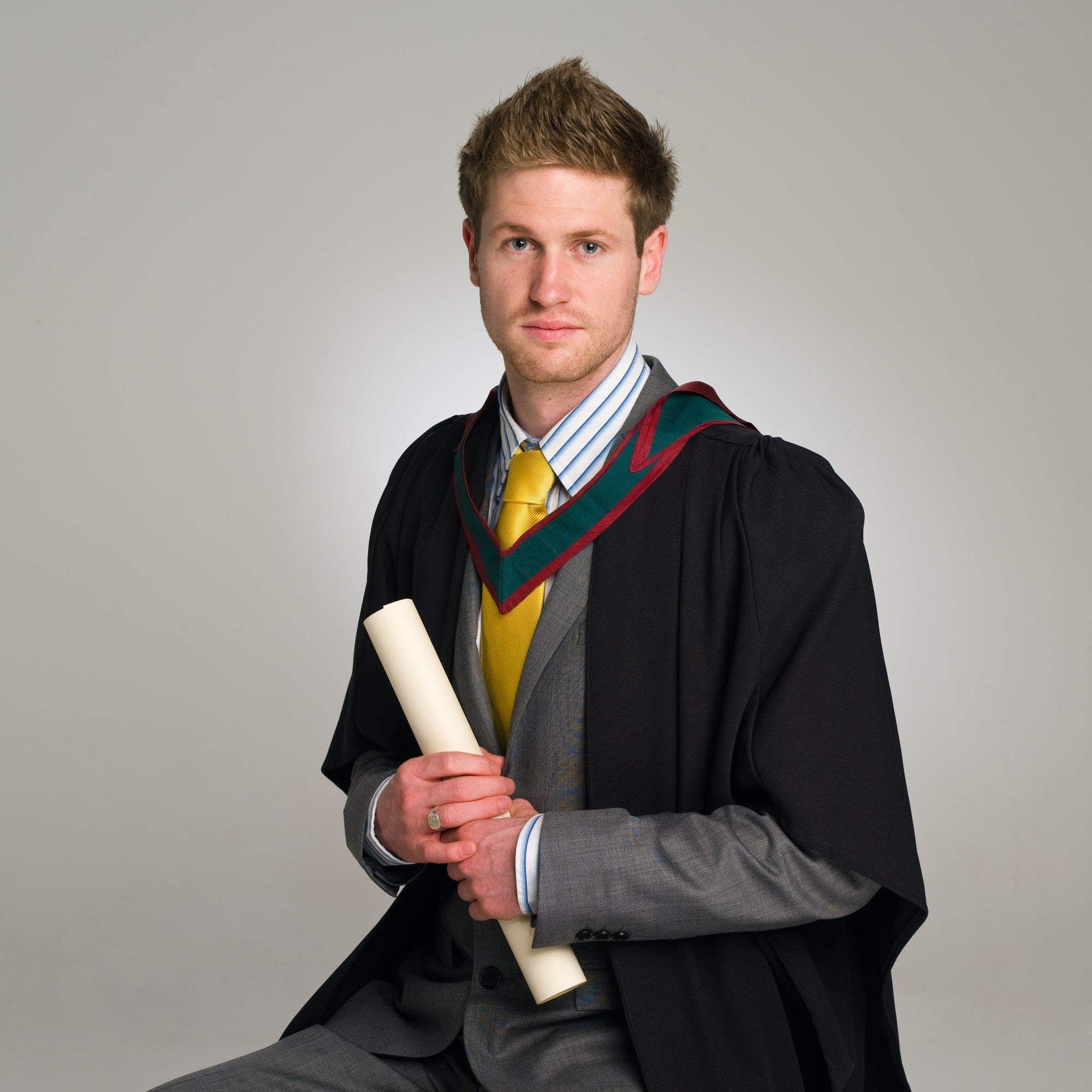 Graduation Portrait in of a young man by PHOTOGENIC Dalkey